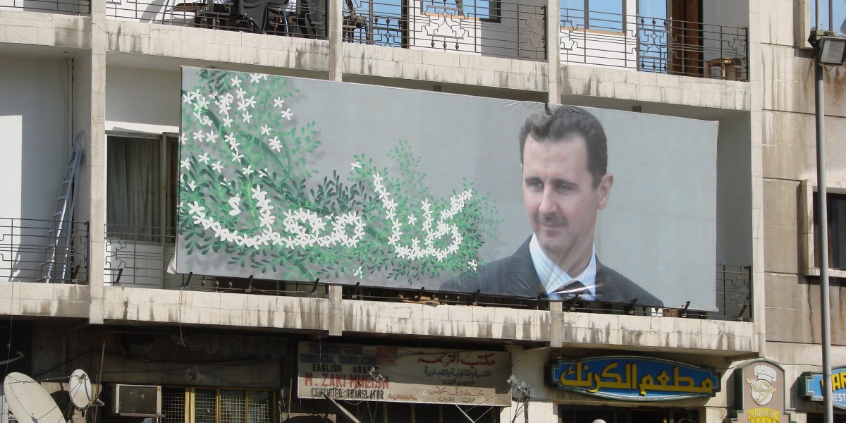 Un poster della propaganda di Bashar al-Assad