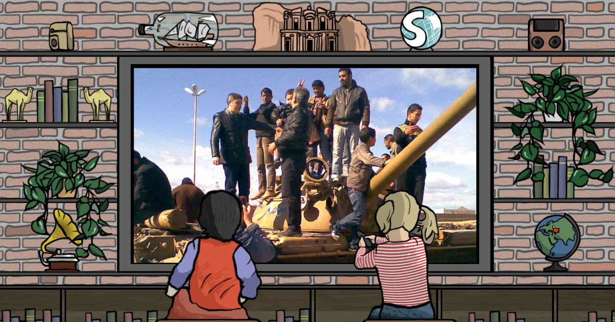 Alcune persone in piedi su un carro armato durante la Primavera araba in Libia, che portò alla caduta del regime di Gheddafi